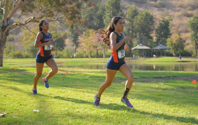 Jessica Ruiz and Brianna Jacklin running.