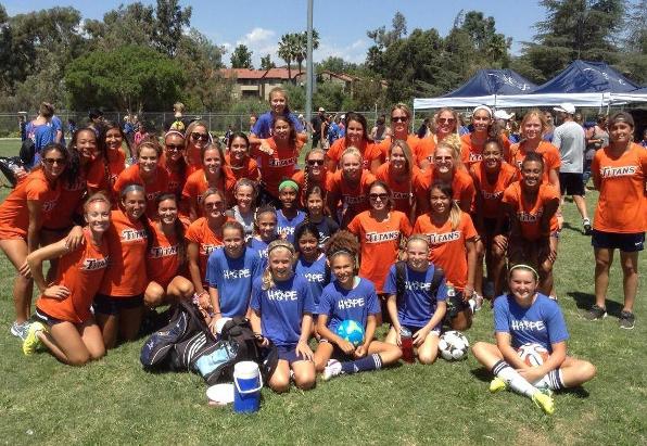 Titans Volunteer with Soccer For Hope