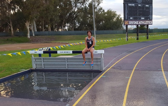 Danny Ramirez sitting on the barrier at the water jump