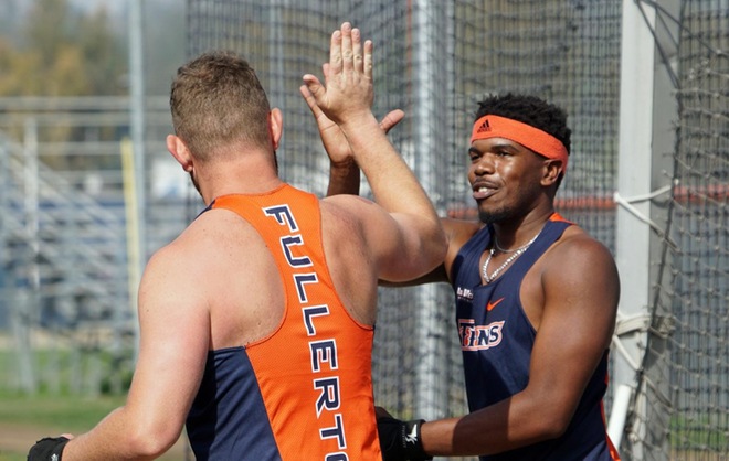 Tanner Miller and Desran Desir exchanging hi-fives