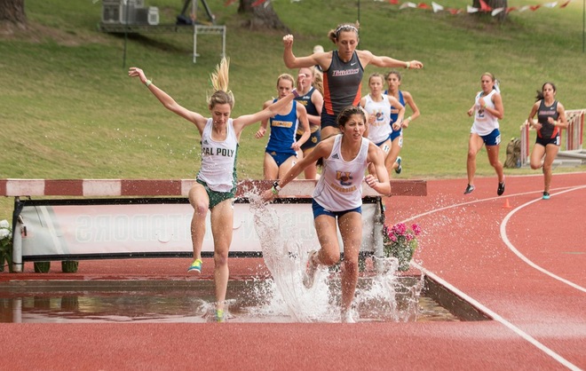 Gabrielle De La Rosa clearing the water jump in the steeplechase