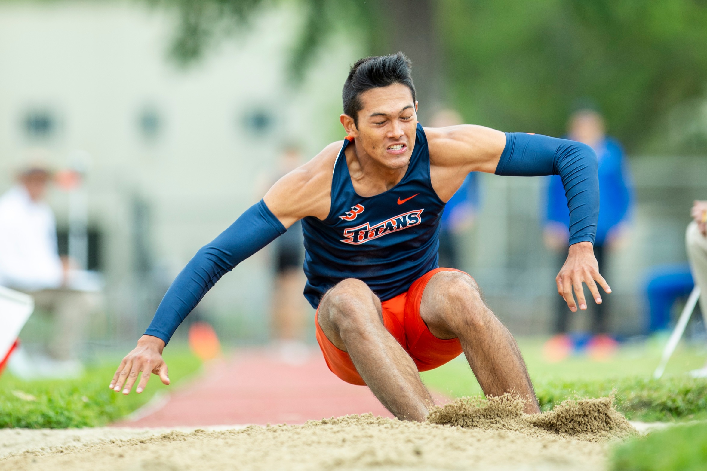 Andrew Aguilar landing in long jump pit